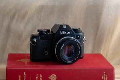 NIKON EM [Small, Round Form]