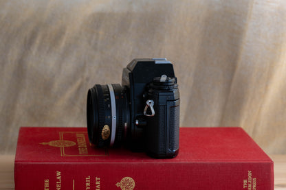 NIKON EM [Small, Round Form]