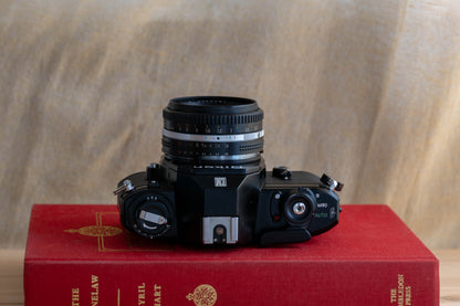 NIKON EM [Small, Round Form]