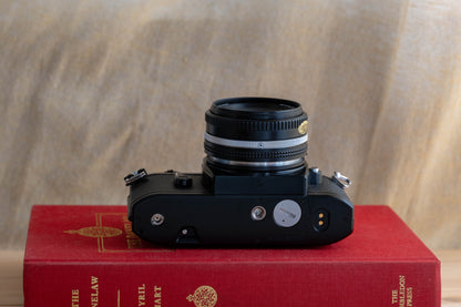 NIKON EM [Small, Round Form]